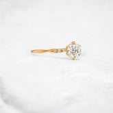 infinite-shine-round-curved-love-moissanite-engagement-ring-0-9-ct-yellow-gold-gemfora-2